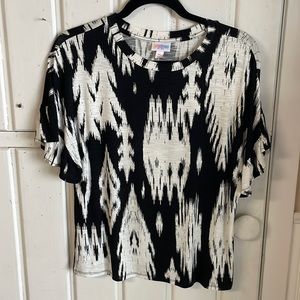 Black and white XS LuLaRoe top